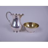 A Victorian silver baluster Jug with scroll handle, Sheffield 1858, maker: M.H. & Co, and a modern