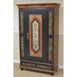 A 19th Century Continental painted pine Armoire with single door having vase of flowers, blue