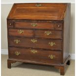 An 18th Century fruitwood Bureau with interior drawers, cupboards and secret compartments, well,