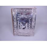 A silver covered Punch Album embossed "Punch", figures, flowers, rosettes, etc, 11 x 9in