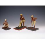 Three 19th Century South Indian wood Figurines, c. 1860, painted and varnished, of practising