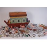 A fine German made mid 19th Century Noah's Ark with hull and hinged roof painted with a bird.