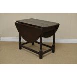 A small 17th Century oak oval Gate-leg Table with iron hinges on primitive turned and square legs