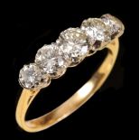 A Diamond five stone Ring claw-set graduated brilliant-cut stones, estimated total diamond weight