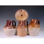 Three 19th Century stoneware Harvest Jugs and a Spittoon, jugs sprigged in relief with hounds,