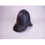 An 18th Century Fire Guard's Helmet from the City of Danzig, of blackened iron with painted