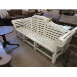 A pair of white painted Garden Benches with arched and scrolled backs and scrolled arms, 8ft 5in W