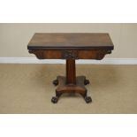 A William IV mahogany Tea Table with rectangular fold-over top on concave square cluster column,