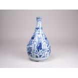 A Chinese blue and white Kraak porselein bottle, Wanli, of onion form, painted with panels of