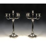 A fine pair of Victorian silver four branch, five light Candelabra with fluted columns, beaded