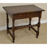 An antique oak Side Table fitted frieze drawer with applied mouldings on bobbin turned and square