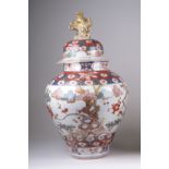 A Japanese Imari Vase and Cover, Edo Period, the shouldered oviform body painted with gnarled