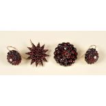 A pair of Garnet and Seed Pearl Earrings and two Garnet Brooches set rose-cut stones