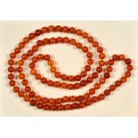 A long Amber bead Necklace, approx 150gms