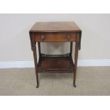 A Victorian rosewood and inlaid drop leaf Occasional Table with shaped top, fitted frieze drawer, on