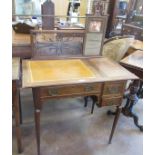 A late Victorian Art Nouveau mahogany lady's Writing Desk with raised back having scroll surmount,