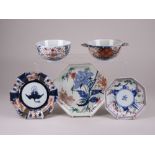 Three Japanese Imari octagonal saucer Dishes and two Bowls, Meiji Period, variously decorated with