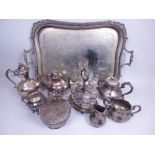 Plated Items: A four piece Tea and Coffee Service, three piece Tea Service, large two handled Tea