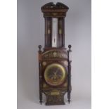 A fine quality Aneroid Barometer by Negretti and Zambra, London, the rosewood case profusely