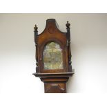 A 19th Century mahogany cased Grandmother Clock, the brass dial with roman numerals and minute