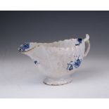 A rare Isleworth blue and white Sauceboat, circa 1768-75, with fluted sides and a smooth area