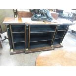 A 19th Century rosewood breakfront Open Bookcase, the moulded top above three bays flanked by turned