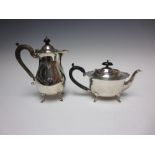 A George V silver shaped oval Teapot on shaped supports, Sheffield 1920, and a similar baluster