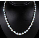 An Opal graduated Bead Necklace with faceted crystal spacers between each bead