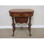 A Victorian walnut Games Table with fold over top fitted single frieze drawer and slide out box,