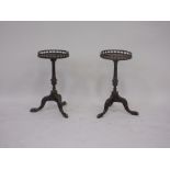 A pair of reproduction George IV mahogany Kettle Stands, galleried circular tops on fluted vase