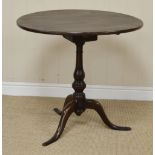 An 18th Century oak Pillar Table on carved baluster column and tripod base, 2ft 5in