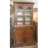 A 19th Century walnut glazed Bookcase with pair of glazed panelled doors flanked by gilt metal