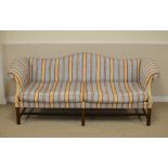 A George III style camel back Settee with blue striped upholstery on six square mahogany supports