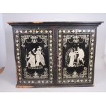 A Regency penwork Table Top Cabinet with pair of doors decorated classical figures including