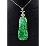 A Jade and Diamond Necklace with carved and pierced plaque suspended from trefoil mount millegrain-