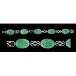 A Jade Bracelet having five oval carved and pierced jade plaques with pierced links between on