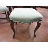 A Victorian Dressing Stool with blue upholstery on cabriole supports