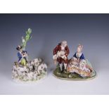 A Meissen porcelain Figure Group of Goatherd with goats and dog on rocky base, 10in H, crossed