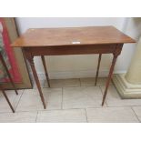 A 19th Century satinwood Side Table, rectangular top over plain frieze and slender turned legs,