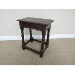 A 17th Century oak Joint Stool with moulded top above shaped frieze on turned and square supports