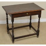 An early 18th Century oak Side Table fitted frieze drawer having brass ring handle on bobbin