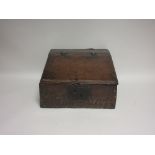 A late 17th Century small oak Bible Box with sloping lid having iron butterfly hinges, the front