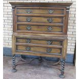A Dutch walnut and rosewood Chest on Stand, moulded cornice above three panelled long drawers on a