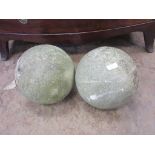 *A pair of carved sandstone Spheres, 1ft D (Sold plus VAT)