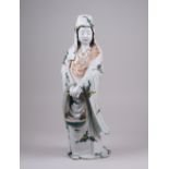 A large Japanese Kutani porcelain figure of Gyoran Kannon, Meiji Period, standing in flowing robes