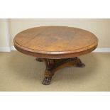 An Impressive William IV oak Breakfast Table with circular top on leafage and scroll carved tapering