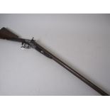 A double barrelled 13 bore side lock pin-fire Sporting Gun by Moore of London