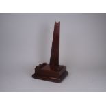 A 19th Century mahogany Plate Stand with stepped base, 15in H