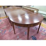 A late Georgian mahogany Dining Table with central dropleaf section and pair of half round ends on