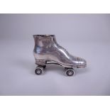 An Edward VII silver Pin Cushion in form of a roller skate, Birmingham 1908, Rgd No 535766